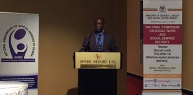 Michael Byamukama speaks at the Ugandan Symposium