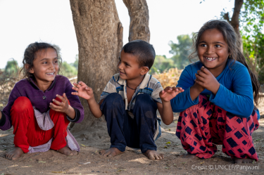 Three children in India